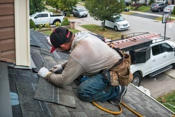 Professional Roofing technician working in Plano, KY